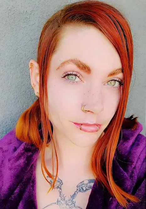 copper hair and light green eyes