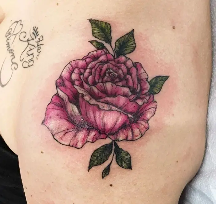 dark pink floral shoulder tattoo