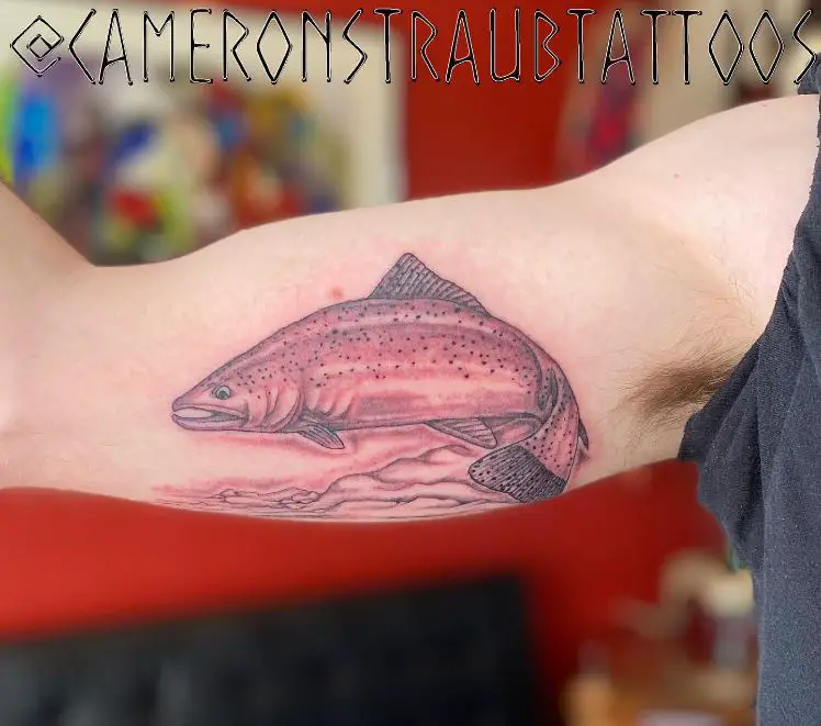 fish tattoo on the arm