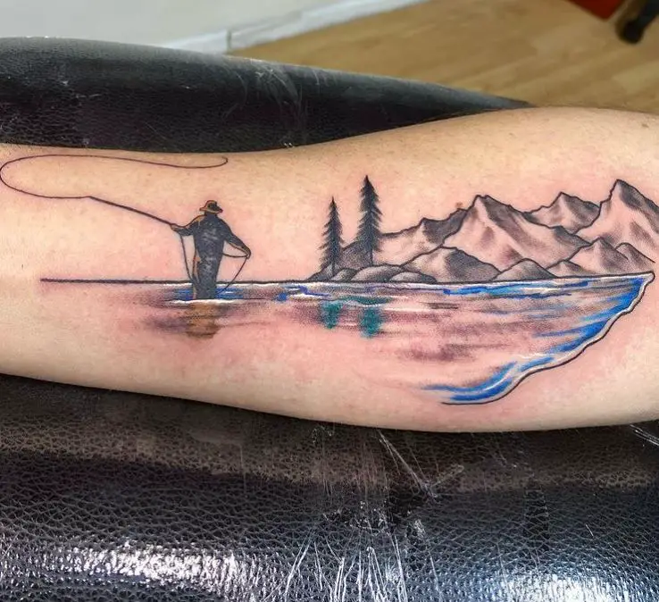 fishing tattoo with white and blue shading