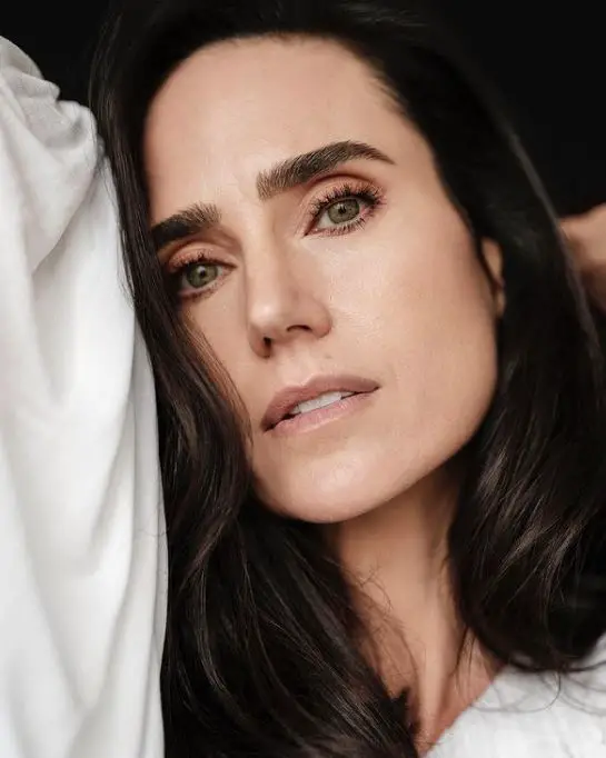 jennifer connelly with black hair and green eyes