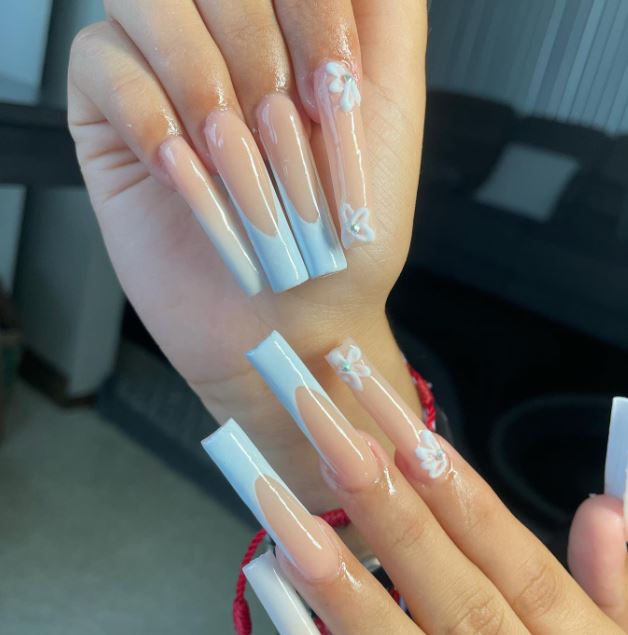 long nails with butterfly design