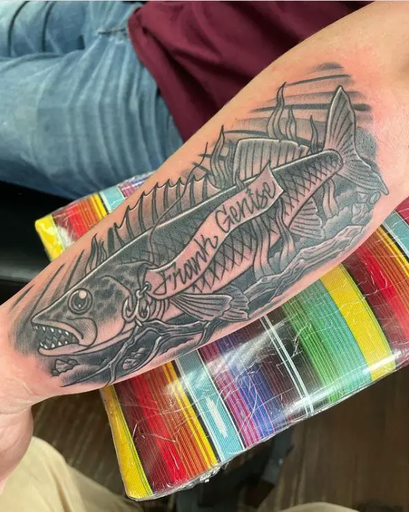 memorial fish tattoo with a name