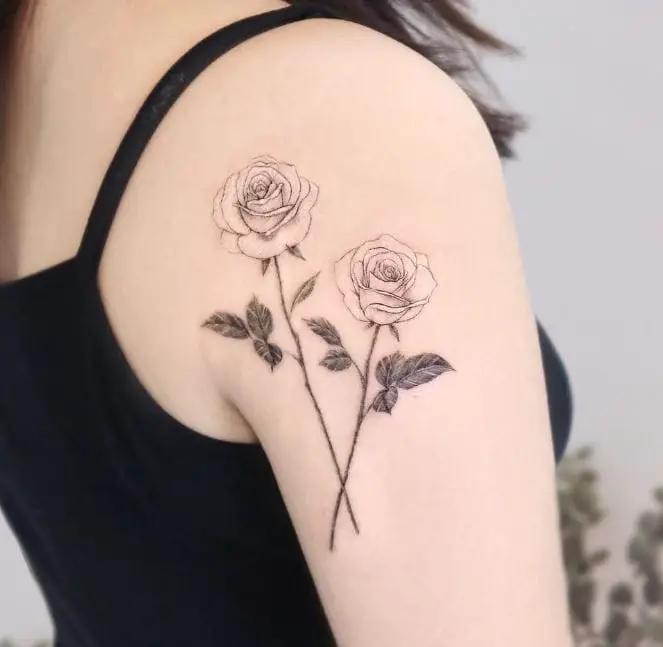minimalistic white roses tattoo