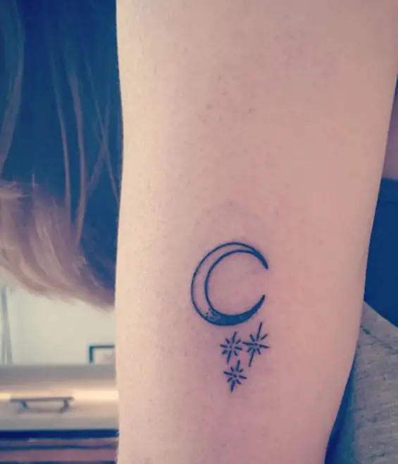 moon and stars hand tattoo