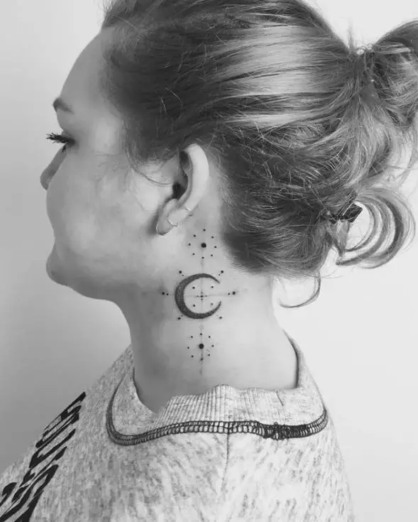 new moon and stars neck tattoo
