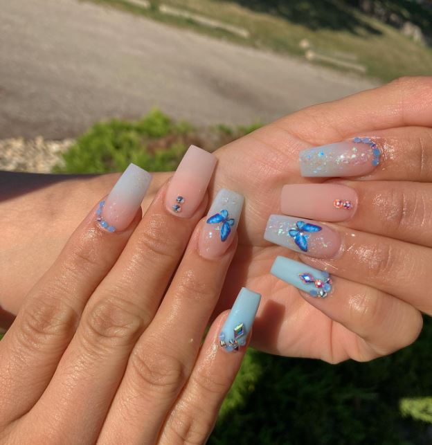 pink and blue butterfly nails