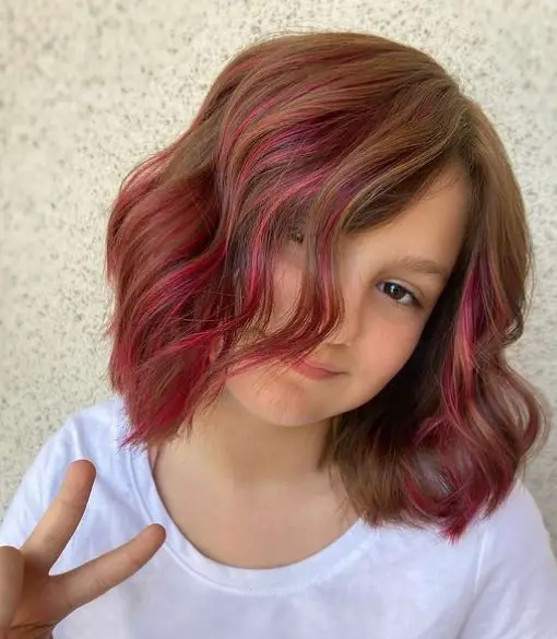 pink highlights on a young girl