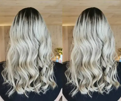 platinum blonde hair with black roots