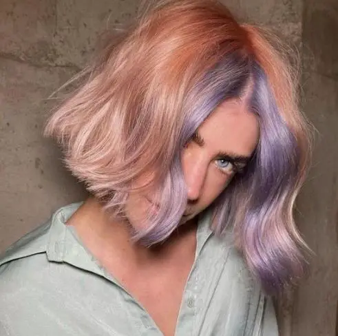 purple highlights on salmon pink hair