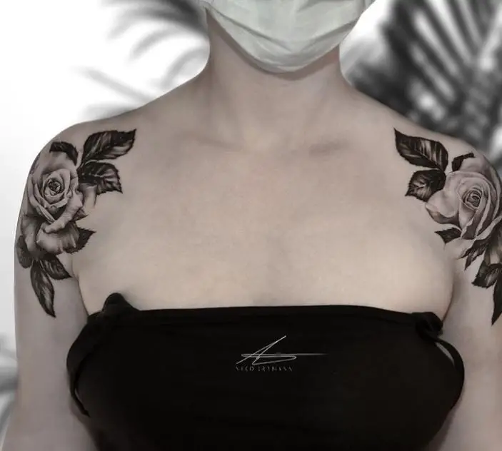 rose tattoos on both shoulders