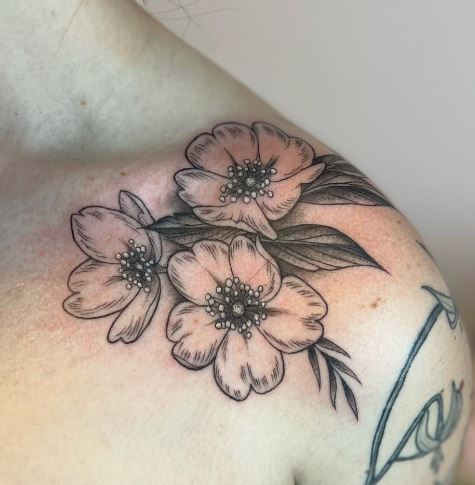 shoulder tattoo with wild roses