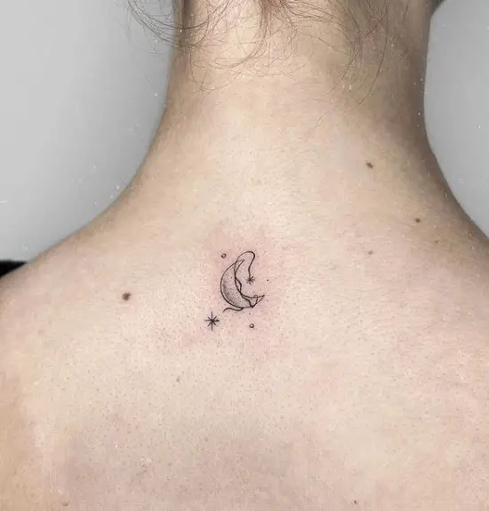 small moon and star tattoo on the back of the neck