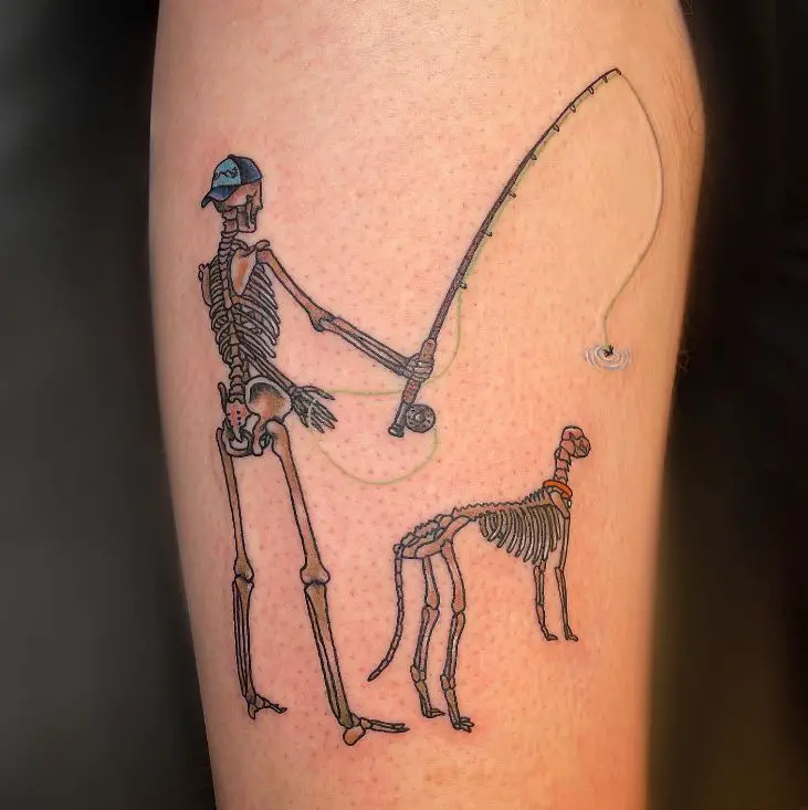 tattoo of a man fly fishing with his dog in skeleton form