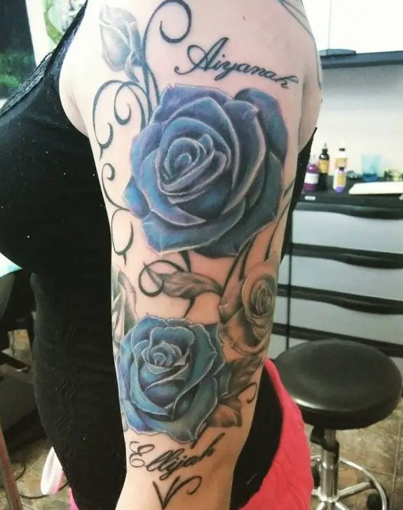 two blue rose tattoos