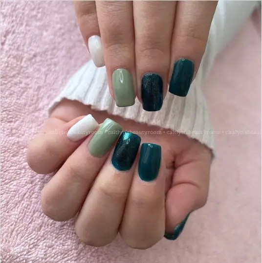 Emerald green, White, and light green Nails