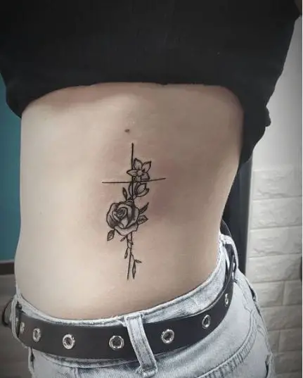 Black Inked Floral Tattoo on Ribs