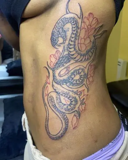 Black and Red Contrast Snake and Flower Tattoo