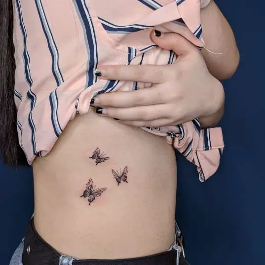 Butterflies Kissing Ribs Tattoo Design