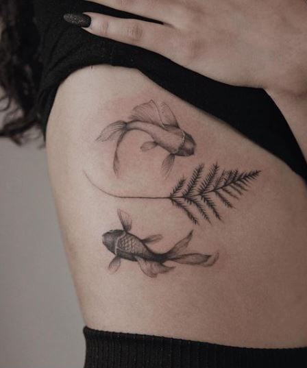 Butterfly Koi and Fern Rib Tattoo