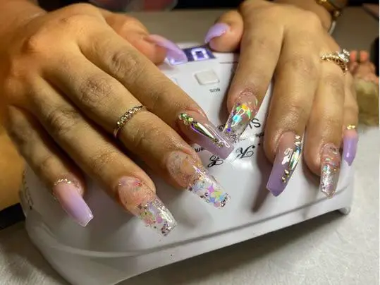 Purple Nails with Crystal Rhinestones and Star-Shaped Decals
