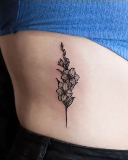 Cute little Floral Rib Inked Tattoo