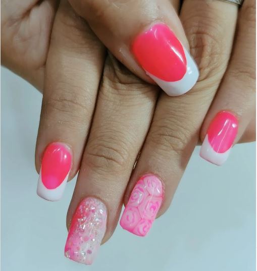 Cute pink nails with white tips and silver glitter