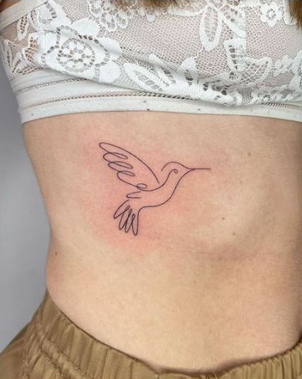 Delicate single line bird tattoo