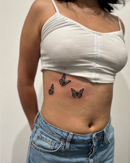 Flying Butterflies Rib Tattoo Art