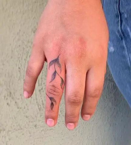 Freehand vine tattoo