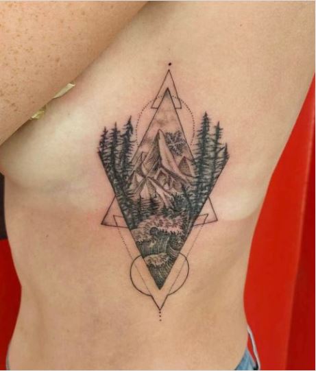 Geometric nature rib tattoo