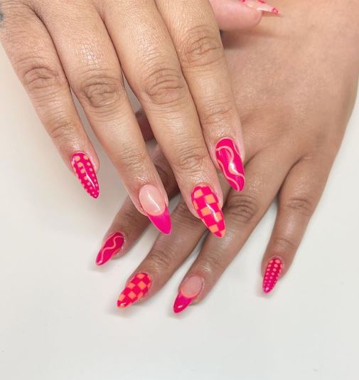 Hot pink nails with checkers design polka dots and stripes