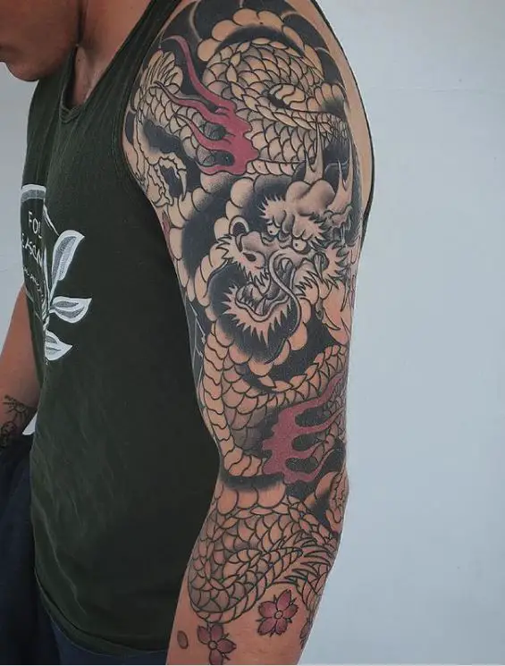 Japanese Dragon Sleeve tattoo with a splash of colour