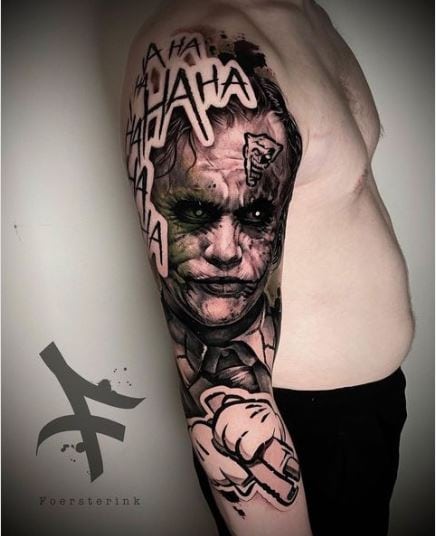 Joker piece arm tattoo
