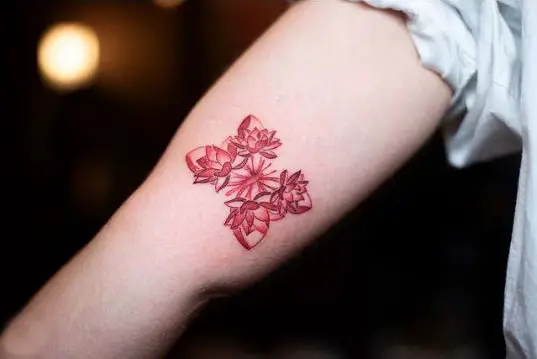 Little red ink lotus and butterfly tattoo