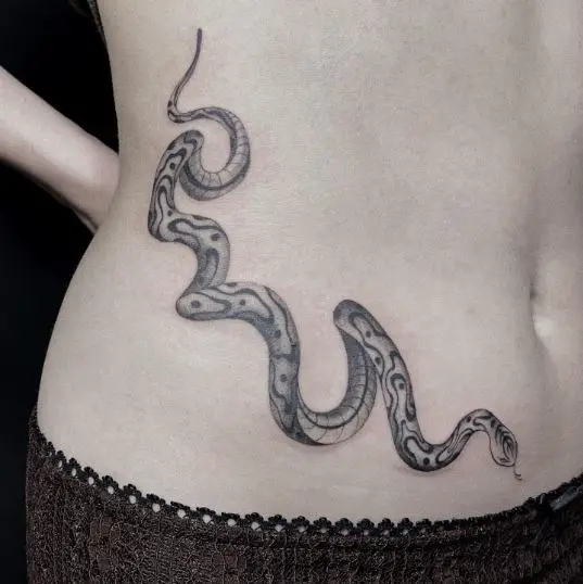 Long Black and Gray Snake Tattoo