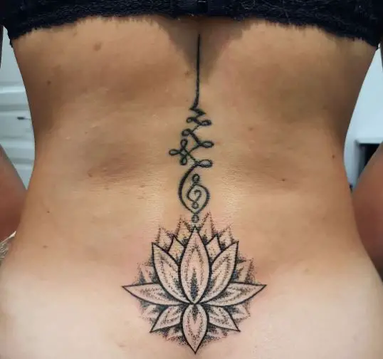Lotus Flower Sketch Tattoo On Spine