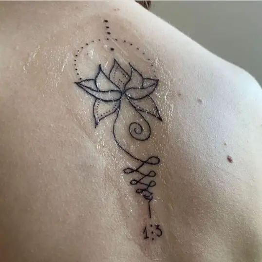 Lotus Line Tattoo Work On The Back