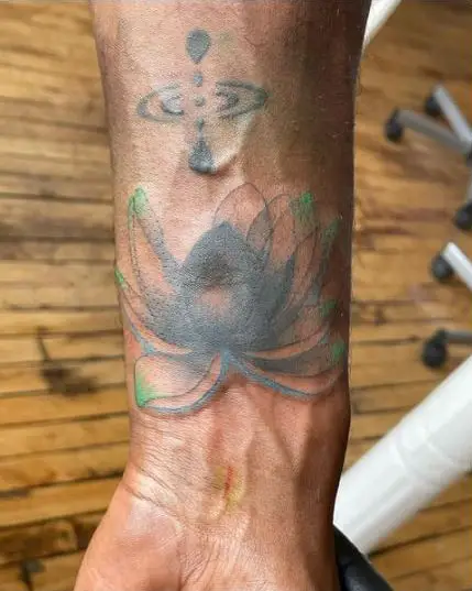 Lotus with color tattoo for hands