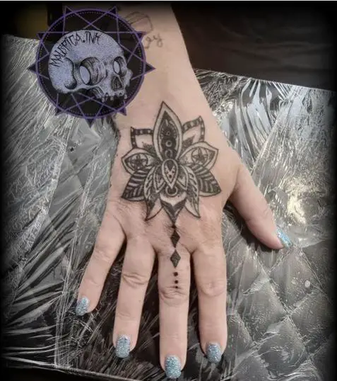Mandala lotus on the hand