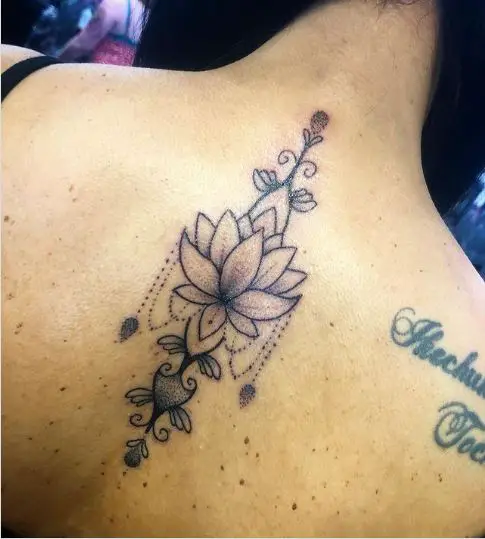 Ornamental Lotus Spinal Tattoo