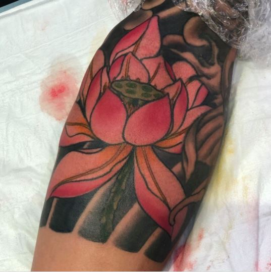 Pink and Black Beautiful Lotus Flower Tattoo