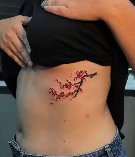 Plum Blossom Rib Tattoo