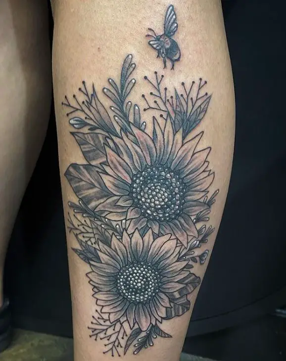 Pretty black n grey floral tattoo