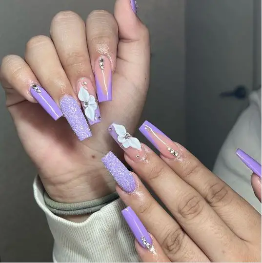 Purple Nails With Glitter and Florals