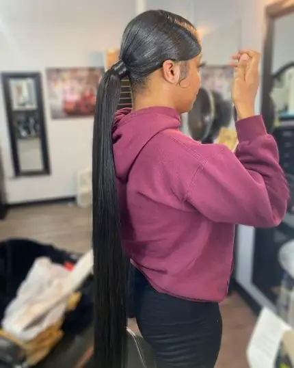 Sleek swoop ponytail with extra long hair extensions