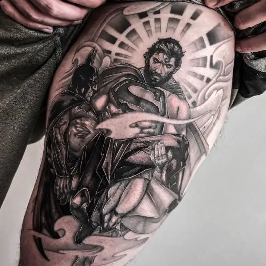 Superman holding Batman tattoo