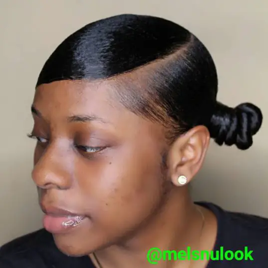 Swoop ponytail with two buns