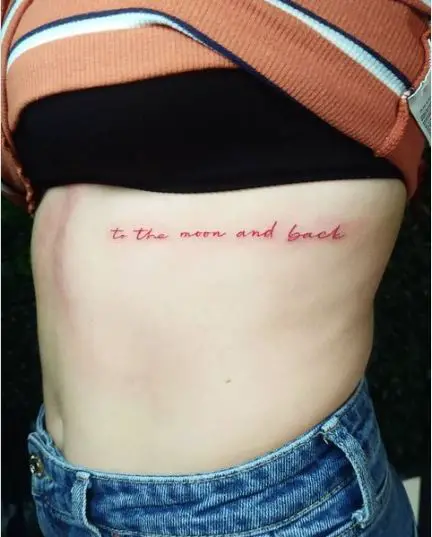 To the moon and back text tattoo