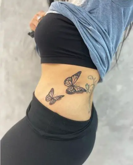 Two 3D butterflies tattoo on ribs